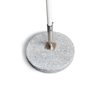 Round marble base designed for outdoor market umbrella, featuring pre-drilled hole for easy assembly, durable and stable for outdoor use in garden or patio