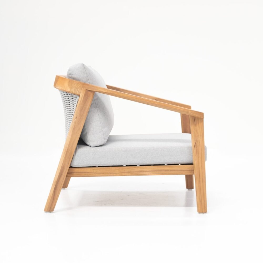 Stylish armchair with teak frame, rope weave back, and weather-resistant cushions, perfect for outdoor use