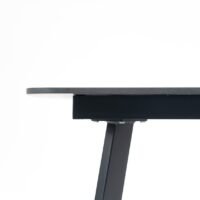 Close-up of outdoor dining table showing thick aluminium frame connection, stable, weather-resistant and durable construction